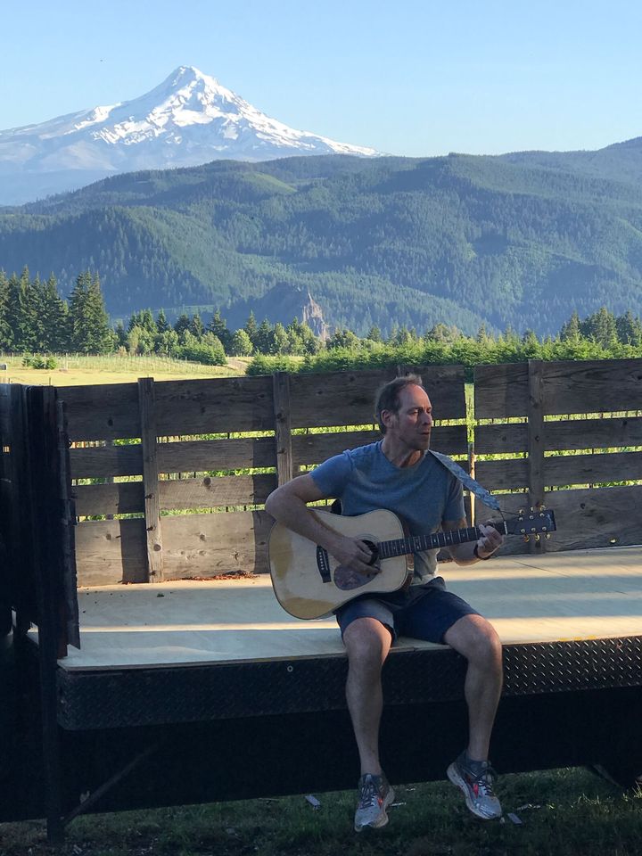 Live guitar music on the deck with Mt. Hood in view